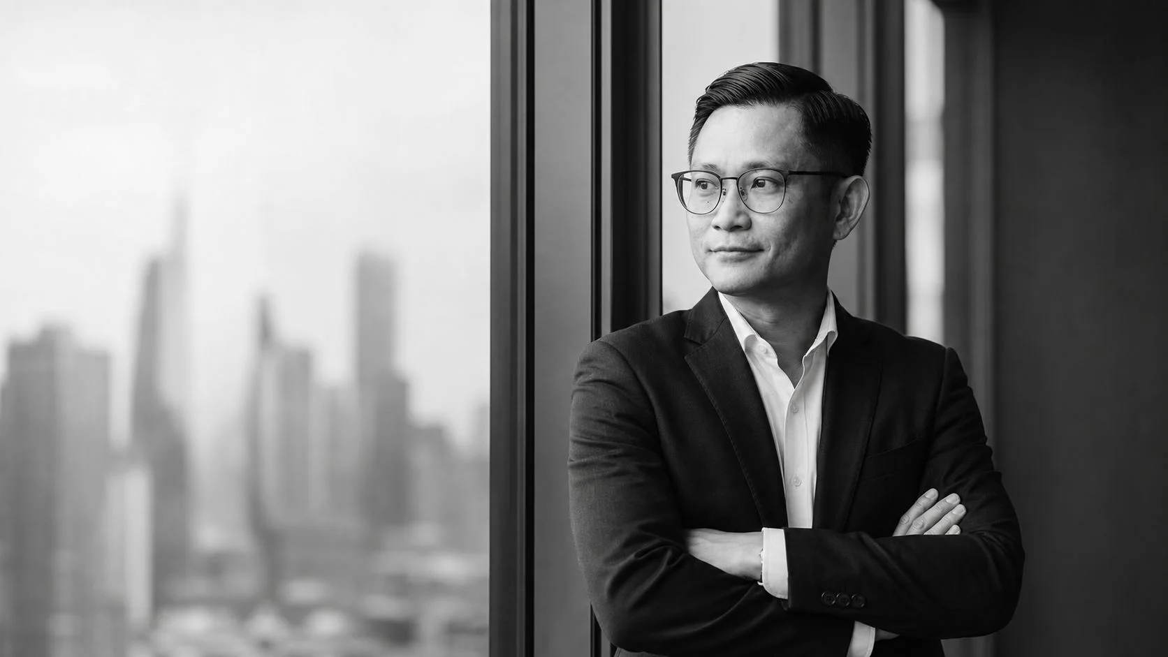 Ziqian, arms crossed, black and white editorial portrait
